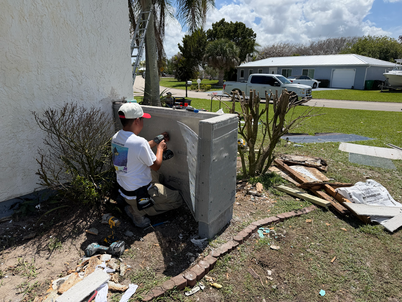 Stucco contractor completing exterior repair and restoration near Tradition Florida